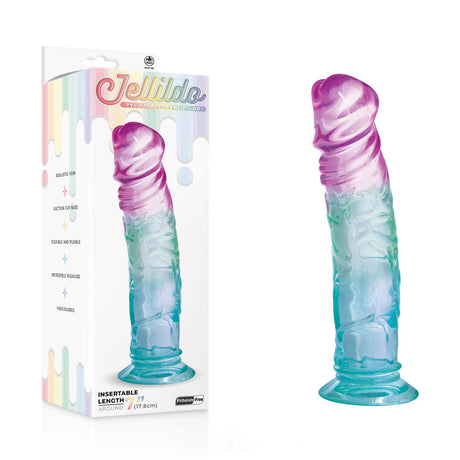 A gradient blue, green, and purple silicone dildo is displayed next to its Jellido 18cm Dildo packaging, featuring a dripping color design that highlights its flexible material and realistic veins. The dildo has a realistic shape with a strong suction cup base for versatile use.