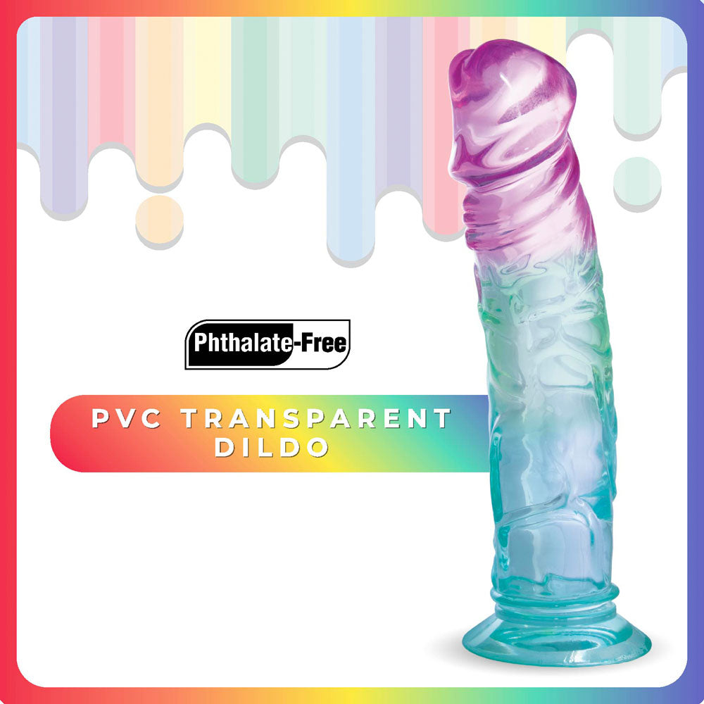 The Jellido 18cm Dildo, featuring a pink-to-blue gradient and realistic veins, is showcased on a rainbow background. Its flexible material provides a lifelike feel. The image includes Phthalate-Free and PVC Transparent Dildo text, with pastel colors dripping on the top border.