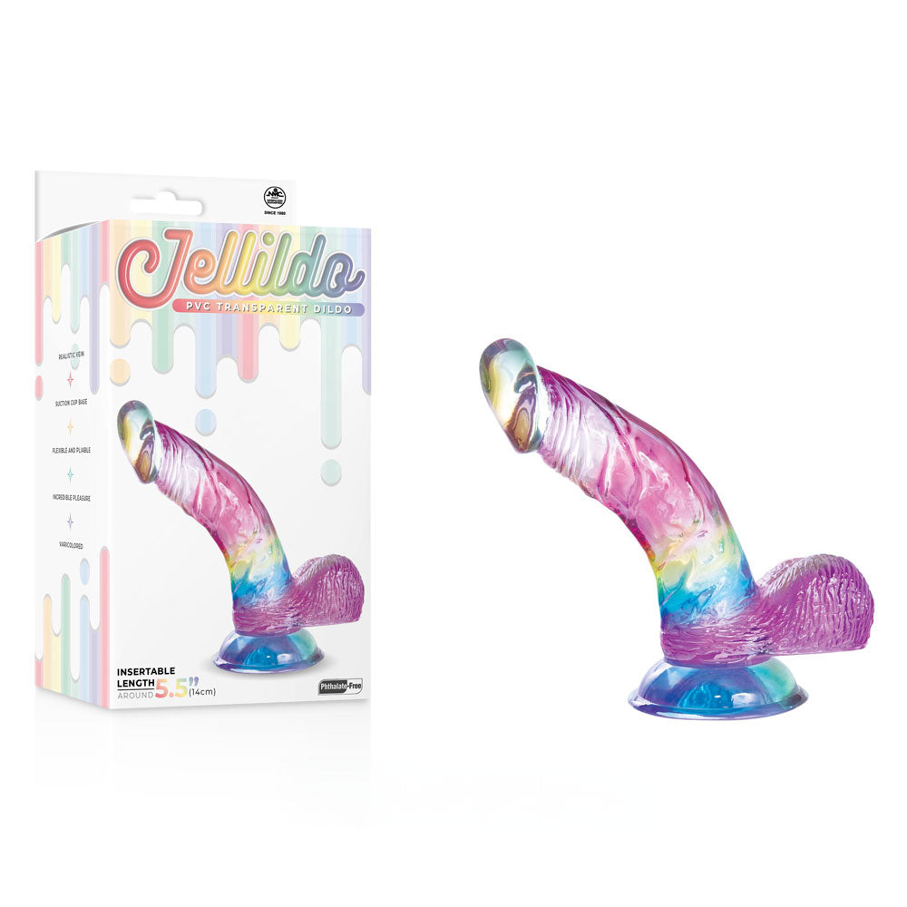 A colorful, translucent Jellido 14cm Curved Dildo with a rainbow pattern stands next to its box. Featuring realistic veins, a curved design, textured details, and a strong suction cup base. The packaging showcases Jellido in playful lettering with rainbow accents and product details.