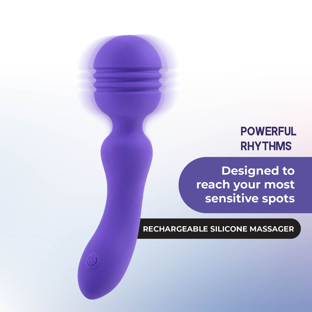 A purple Xciter massage wand with a ribbed top and curved handle is displayed on a gradient light blue background. Featuring Vibrating Rhythms and Designed to reach your most sensitive spots, it boasts USB-C rechargeability.