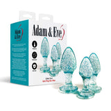 The Adam & Eve Glitter Gem 3-Piece Butt Plug Set comes in blue with three glitter-filled plugs of increasing sizes. The packaging highlights the brand, product details, and indicates its tapered, travel-friendly, and designed with a body-safe gem-shaped base.