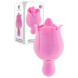 The image shows the Adam & Eve EVES RAVISHING CLIT FLICKING ROSE, a pink USB rechargeable rose-shaped stimulator with a petal design and smooth texture, ideal for clitoral orgasms. Its packaging presents the brand name in sleek black text on a white background.