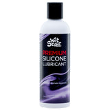 The 235g Wet Stuff Premium Silicone Lubricant features a black cap with purple swirls and bold red/white text, claiming Universal intimate lubricant. Its condom-compatible, ideal for full body massages, competitively priced, and proudly made in Australia.