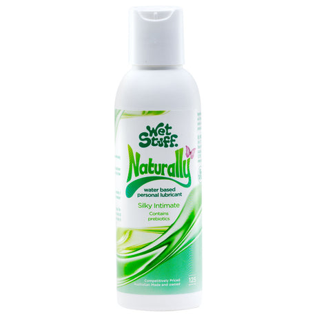 The Wet Stuff Naturally water-based lubricant, in a 125g bottle, features green and white colors with leaf graphics and a pink butterfly. It highlights Silky Intimate, is hypoallergenic, and contains prebiotics.