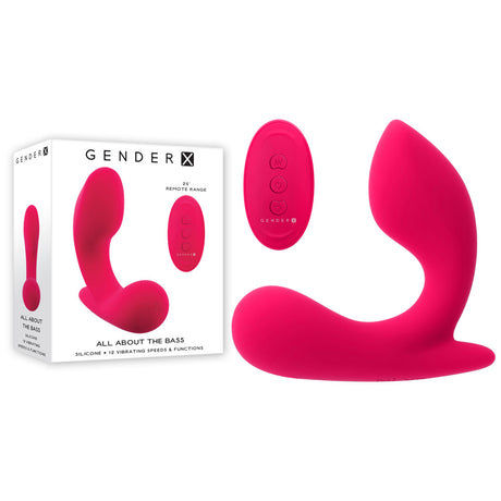 The Gender X ALL ABOUT THE BASS pink USB rechargeable wearable vibrator with wireless remote is displayed alongside its small three-button remote. The packaging shows the device and branding.