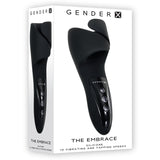 The image of Gender X THE EMBRACE, a black silicone USB rechargeable male vibrator, features three handle buttons. The packaging highlights 10 vibrating and tapping speeds for an exciting experience, with sleek design on a white background emphasizing its waterproof feature.