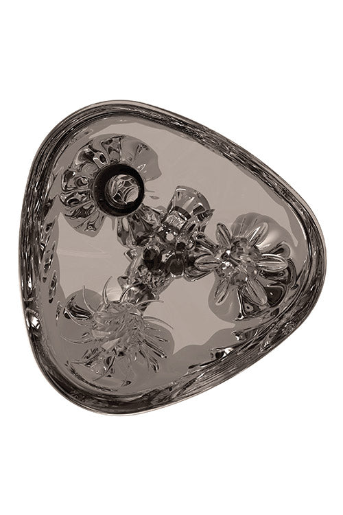 The Adam & Eve Adams 3-Way Stroker - Clear Triple Hole Stroker is a transparent, tri-cornered design with intricate details and an easy-grip exterior. It features three openings for varied experiences, with its reflective surface emphasizing the craftsmanship.