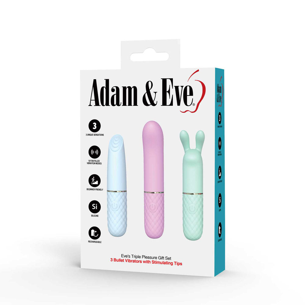 The Adam & Eve TRIPLE PLEASURES set includes three pastel bullet vibrators—lavender, pink with a rounded tip, and a green clitoral stimulator with rabbit ears—all housed in a white box. Features include 3 speeds, splash-proof design, silicone material, and USB rechargeability.