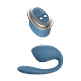 The Adam & Eve FOUR-PLAY Vibrator Set, featuring a sleek blue wearable massager, pairs seamlessly with its remote control. Its ergonomic curved shape ensures comfort and easy handling, while the oval-designed remote includes an on-off button and two smaller controls.