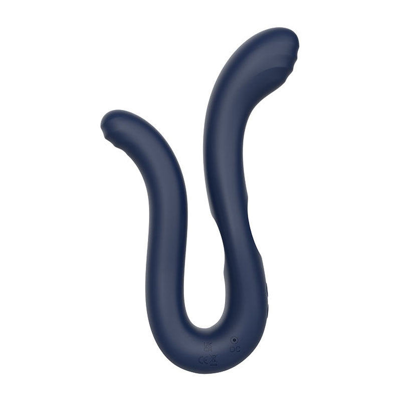 The Adam & Eve Twisted Temptations Bendable Vibe in navy blue is a 22.4 cm flexible, U-shaped dual vibrator crafted from smooth, seamless silicone with two rounded ends for ergonomic, unisex use. Its waterproof and USB rechargeable, featuring a power button and charging port on one side.