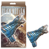 The Alien Nation - Gila in Blue/Gold showcases a textured sheath against a cosmic backdrop of planets and mountains. Made from 100% body-safe silicone, it teases, The Earthlings are gone. Only the cock-sheaths survived. Your ultimate fantasy awaits.