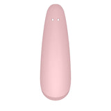 The Satisfyer Curvy 2+ is a pink silicone clitoral stimulator with a smooth, elongated oval shape and two small holes. Its matte surface adds softness, while the darker bottom enhances its design. Compatible with the Satisfyer Connect App, it offers an app-controlled, touch-free experience.