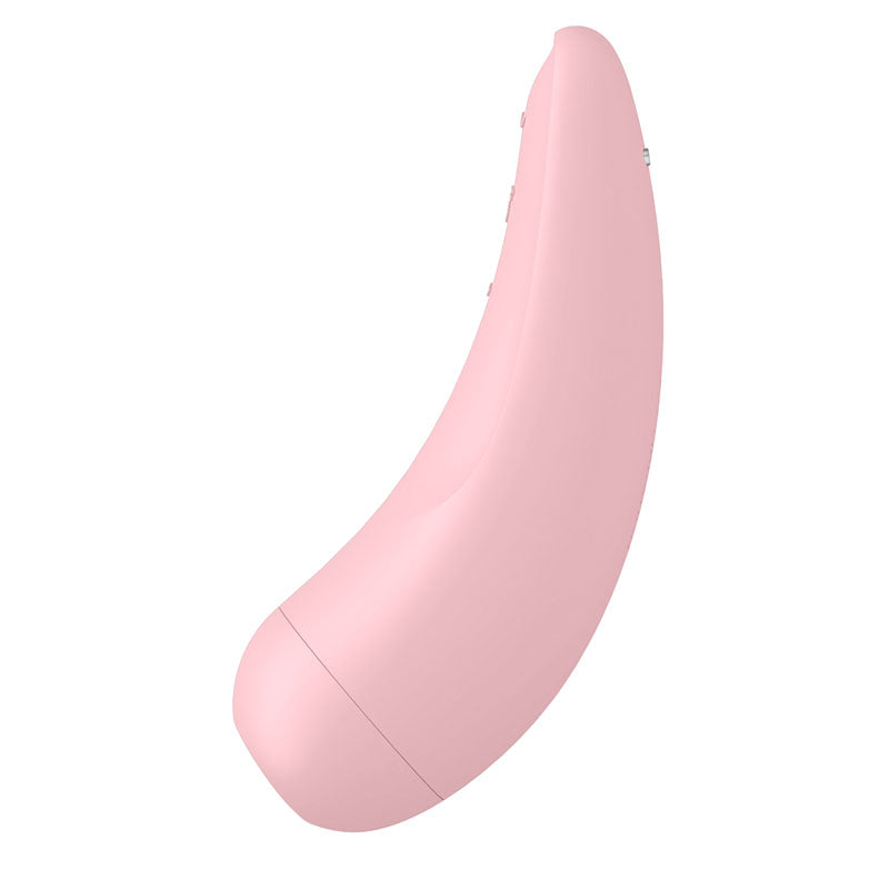 The Satisfyer Curvy 2+ is a pink, ergonomic handheld device featuring Air Pulse technology, a smooth surface, and two side buttons. Its detachable compartment suggests extra features and it tapers elegantly for seamless app use with the Satisfyer Connect App.