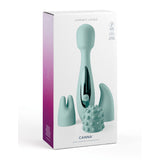 The box for the teal JimmyJane Canna 21.8 cm Massage Wand highlights its silicone, waterproof design with three interchangeable heads: a pointed tip, plush textured cover, and dual-pronged option. Deep rumbling vibrations and an ultra-powerful motor enhance its versatility and function.