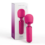 A JimmyJane Exona - Pink 18.3 cm USB Rechargeable Massage Wand with a rounded head and ergonomic handle is in front of its box, which shows the same image and branding. A small control panel on the handle allows for deep vibrations to enhance comfort.