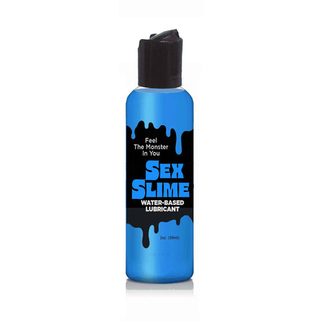 A small, translucent blue bottle labeled Sex Slime - Blue Water Based Lubricant with a black flip-top cap invites indulgence in your monster kink. The size is clearly marked as 60 ml (2 oz) on a crisp white background, urging you to Feel The Monster In You.