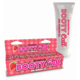 The image displays a tube and box of Booty Call Anal Numbing Gel - Strawberry Flavoured. The playful pink packaging features polka dots and a strawberry graphic, promising For a More Pleasurable Anal Experience, perfect for those exploring flavored anal play.