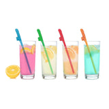 Four glasses filled with colorful drinks are lined up, each garnished with lemon slices and a colorful sword stirrer: blue in pink drink, green in yellow, orange in orange, and red in blue. A half lemon is on the left next to Super Fun Penis Party Straws - Multi Colored Dicky Straws.