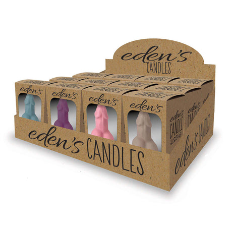 A cardboard display features Edens Candles, offering 12 colored vanilla-scented candles shaped like abstract human figures. With elegant black script branding on a natural brown background, its a statement piece not to be missed.