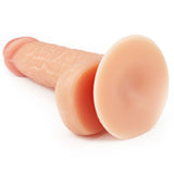 The Ultra Soft Dude - Flesh 17.8 cm Dong is a realistic silicone dildo with detailed veining, a pronounced head, and a flared round base for stability. Its ultra-soft texture and slightly shiny surface enhance comfort and realism.