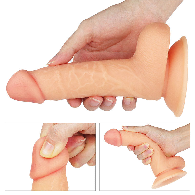 The image showcases The Ultra Soft Dude - Flesh 17.8 cm (7) Dong, featuring a realistic silicone texture with a suction cup base. It is flesh-toned with detailed veins and a defined head. Insets show close-ups of the tip being pinched and the dong held at an angle in hand.