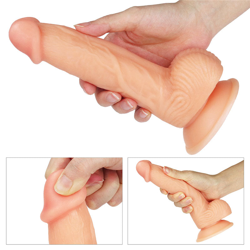 Close-up of a hand holding The Ultra Soft Dude - Flesh 20.3 cm (8) Dong with a suction cup base and textured details. Smaller images display the flexible, realistic dildo from various angles, showcasing its detailed surface.