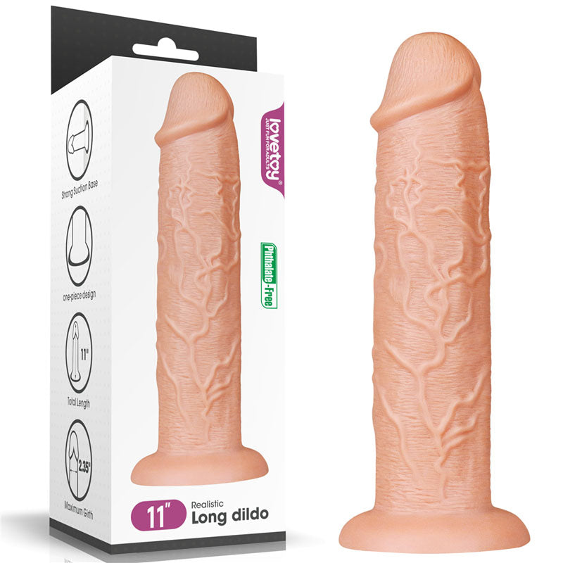 An 11-inch King Size Realistic Dildo in flesh tone, featuring a veined texture, stands next to its box. The packaging highlights the strong suction cup base, one-piece design, total length, and maximum girth. It is labeled PVC free and skin-safe with a check mark icon.