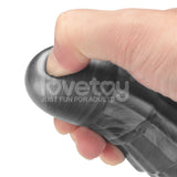 A grey Vibrax Slider, 36.8 cm long and USB rechargeable, indents under pressure from a hands thumb. Branded lovetoy, just fun for adults, this flexible dildo offers 10 vibration functions for adventurous play.