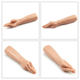 Four views of the King Sized 13.5 Realistic Magic Hand in flesh tone, crafted from phthalate-free PVC. The top images show the palm with slightly bent fingers; the bottom images display the dorsal side with veins and tendons visible. Each view is in its own quadrant.