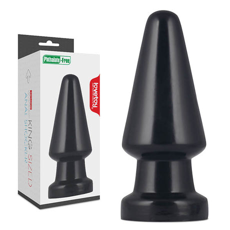 The King Sized 7.5 Anal Shocker - Black 19 cm Mega Butt Plug features a large black silicone plug with a tapered top and wide base, next to sleek packaging with a red label, promoting it as phthalate-free and water-based lubricant compatible for comfort.