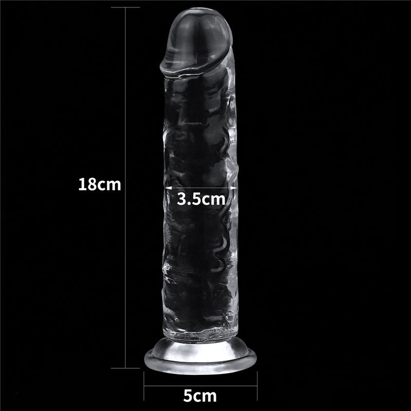 The Flawless Clear Dildo 7 from the LOVETOY Shameless Clear Series features a phallic, textured design. Its transparent and skin-safe, stands on a suction cup base, measures 17.8cm tall, 3.5cm wide with a 5cm base diameter, and is strikingly displayed against a black background.