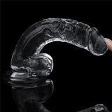 A Flawless Clear Dildo 7.5 from the LOVETOY series is set against a black background. Its realistic ridges and curves are designed for enhanced pleasure, with a finger highlighting its glossy, skin-safe surface.