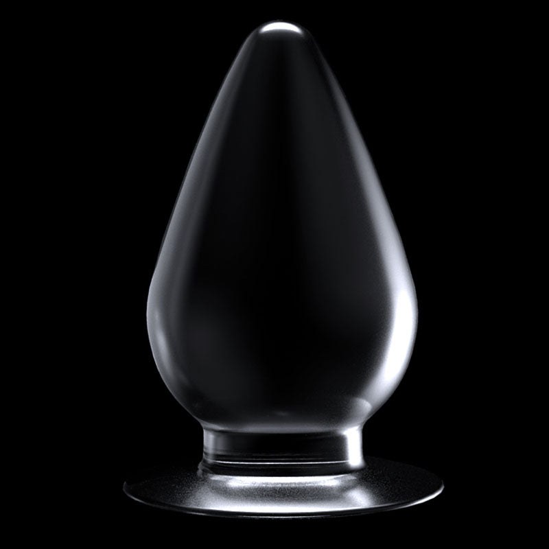 A chrome-colored, metal, teardrop-shaped object with a smooth finish against a black background mimics the Flawless Clear Anal Plug 4.5. Its reflective surface, narrow tip, and wider base highlight its glossy texture and skin-safe appeal.