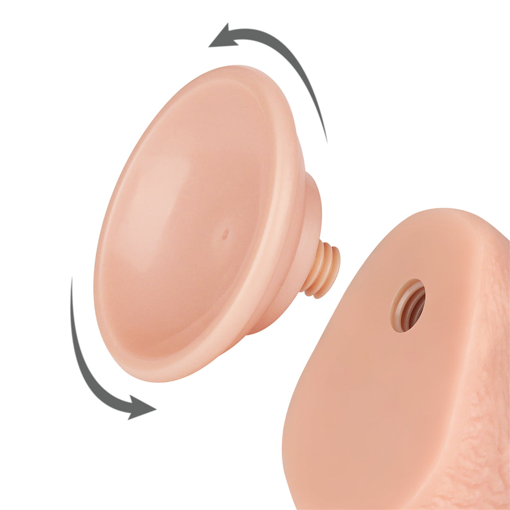 Close-up of a flesh-toned Sliding Skin Dual Layer Dong with dual density and screw-like attachment pointing to a device socket. Two arrows show rotational movement needed to attach, highlighting the textured side and circular opening.