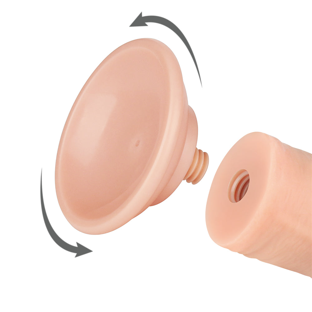 A close-up of the Sliding Skin Dual Layer Dongs detachable beige suction cup with dual density technology and screw attachment, featuring rotating arrows for attachment/removal against a plain white background.