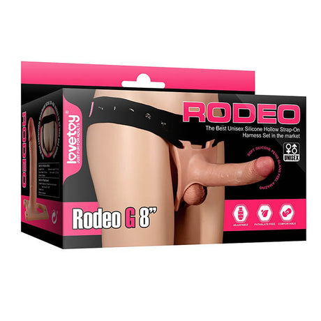 The Ingen Hollow G 8 - Flesh 20.3 cm Hollow Strap-On by Lovetoy is a strap-on harness with a realistic skin-toned dildo. The pink and black package features Rodeo G 8” and unisex, highlighting its adjustable, portable, comfortable design for erectile dysfunction.