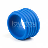 The Pinnacle Pro Deep Rib Grip - Blue Cock Ring is an adult novelty silicone ring with a smooth finish, engraved lovetoy text and a heart design, and the tagline Just fun for adults, all against a plain white background.