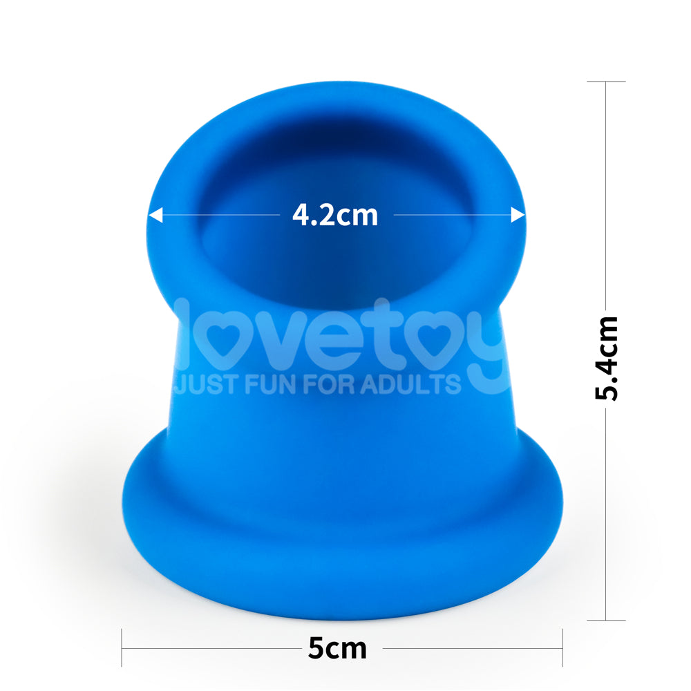 The Pinnacle Pro Tapered Squeeze - Blue Ball Stretcher includes a blue silicone suction cup with a wide, flat base, narrower top, and printed measurements: 5.4 cm tall, 5 cm base diameter, and 4.2 cm opening diameter. Lovetoy and Just Fun for Adults adorn its side for playful uses.