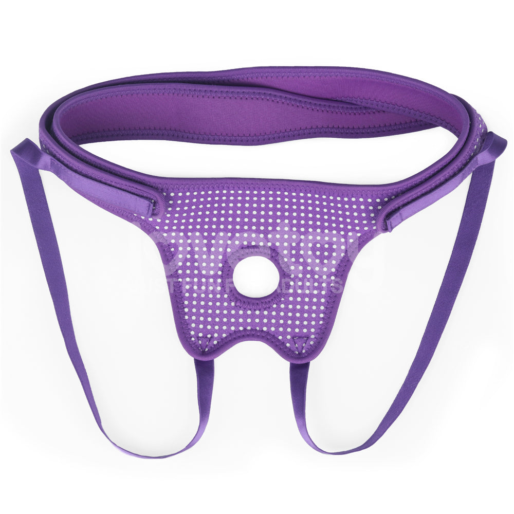 The Ingen Easy Strap-On Harness in purple provides a comfortable fit with a supportive waistband and adjustable Velcro sides. It features a central panel with a circular opening, adorned with small white dots, and has straps that extend gracefully downwards from the sides.