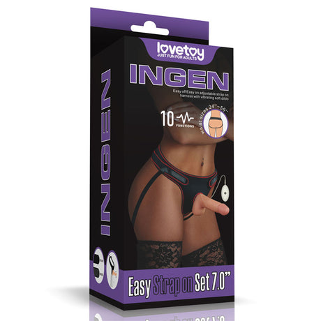 The box of the Ingen Vibrating Easy Strap-On Set - Flesh 17.8 cm showcases a model wearing the vibrating strap-on, highlighting 10 functions and an adjustable strap-on belt. The model is in lace-detailed lingerie, and the image features a black and purple color scheme.