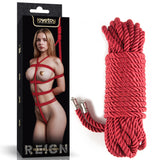 The Rebellion Reign Silky Bondage Rope - Red product image features a model in red rope packaging art alongside an ebony rope with luxurious metal-tipped ends, epitomizing luxurious bondage designs and boasting a silky-smooth texture.