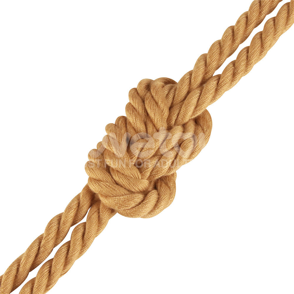 A close-up of the Rebellion Reign Bondage Rope in natural color, tied in a double overhand knot at a diagonal against a white background. The ropes twisted fibers and sturdy texture are prominently showcased, emphasizing its excellent craftsmanship.