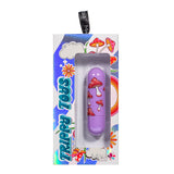 The image showcases the Maia JESSI Trippy - Lavender, a 7.6 cm USB Rechargeable Bullet, packaged uniquely with red and white mushrooms plus colorful designs like rainbows, flowers, and clouds beneath Trippy Toys. A black loop marked Maia adds flair to the whimsical presentation.