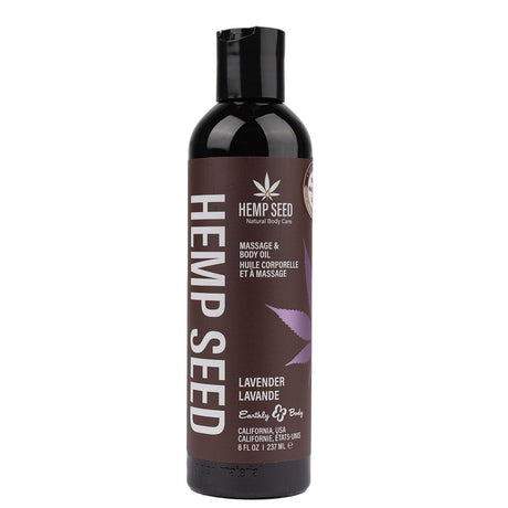 A 237 mL black plastic bottle with a flip-top lid is labeled Hemp Seed Natural Body Care. The text reads Lavender Massage & Body Oil, showcasing its natural appeal. A purple cannabis leaf graphic adorns it, and Earthly Body is displayed near the bottom.