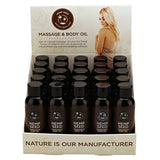 A display box of 25 Hemp Seed Massage & Body Oil bottles (59 ml each) features a womans photo and emphasizes softness with natural oils. NATURE IS OUR MANUFACTURER is boldly printed, while each dark bottle has a unique label & logo celebrating hemp seed oils benefits.