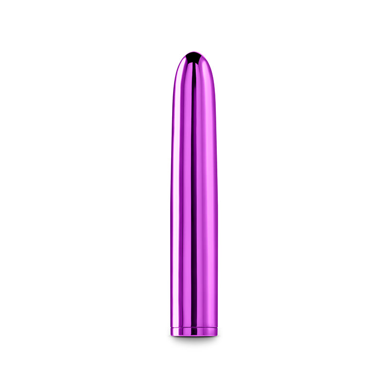 A purple, metallic, bullet-shaped object with a smooth surface stands upright on white. This sleek design is the Chroma - Purple - Metallic Purple 17 cm USB Rechargeable Vibrator, tapering at the top with a rounded tip and featuring multi-speed functions for versatility.