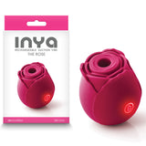 A pink box on the left features INYA The Rose - Red text, revealing a red silicone clitoral air pulsation stimulator with cutting-edge technology and a glowing power button. On the right, the device displays its elegant rose petal design and round top hole.