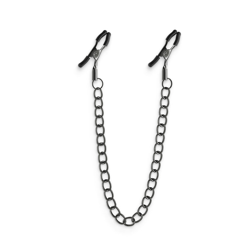 The Bound Nipple Clamps - DC2 in gunmetal feature a metal chain with round links and adjustable nipple clamps with black handles and silver gripping ends, designed to enhance erotic sensations, all set against a plain white background.