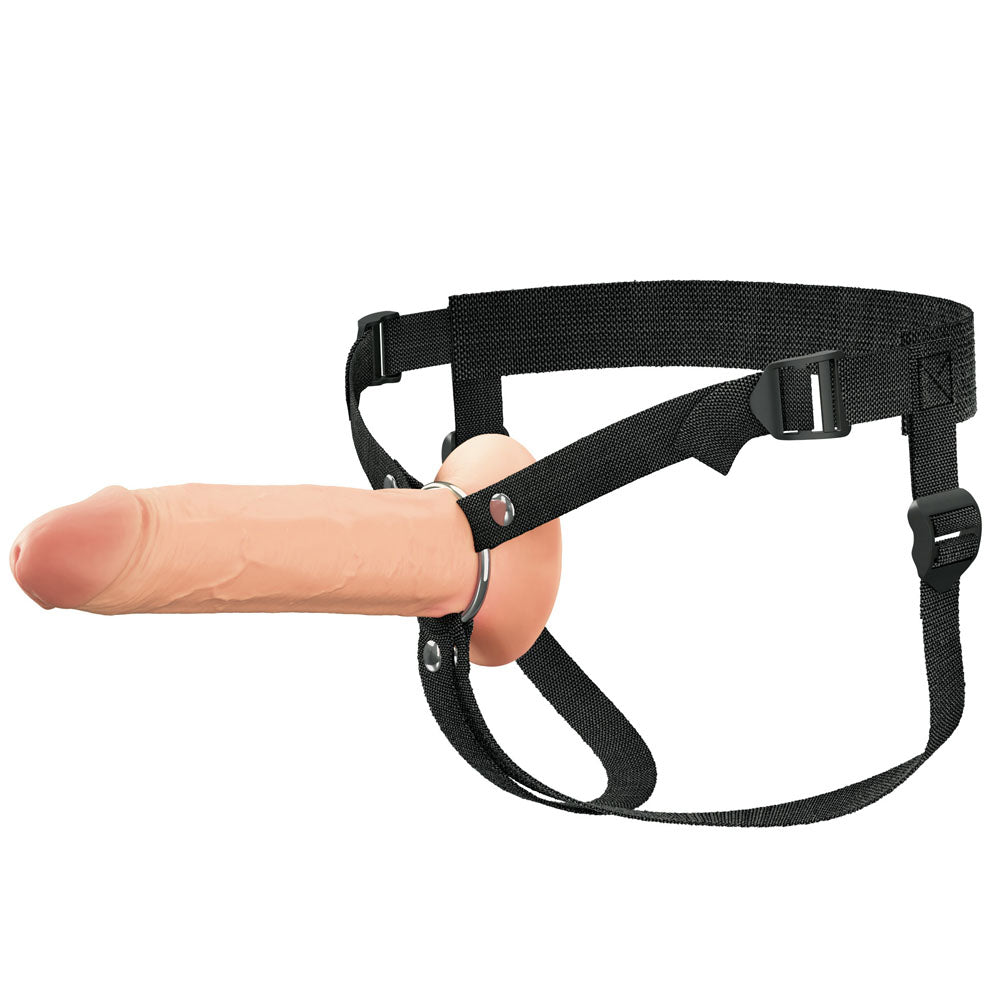 The FX Elite 8 Silicone Hollow Strap-On in flesh features a realistic, beige phallic shape with a textured, dual-density design. It comes with black adjustable straps and buckles for optimal fitting around the waist and thighs.