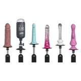 Lined up for the FFS Body Dock Sex Machine are six attachments: a realistic brown dildo, a black machine mount, a turquoise ribbed piece, a clear pink dildo, a white spiral-textured attachment, and a pink rabbit-shaped vibrator. Each exhibits impressive thrust capability on its black base.